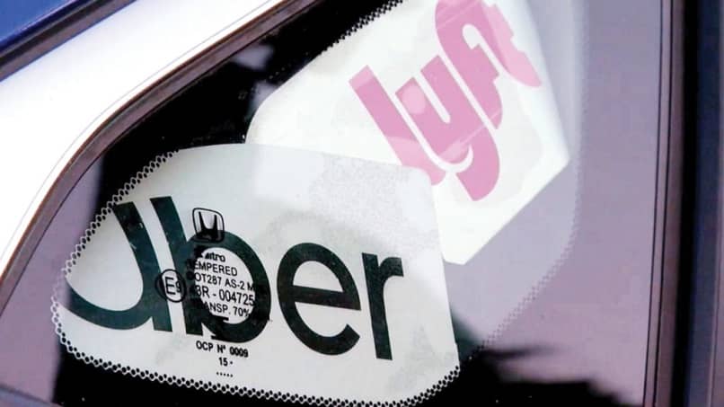 logos uber lyft ventana auto