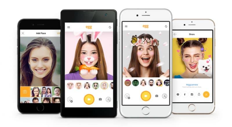 personas en pantalla del movil Snapchat con filtros de mascaras