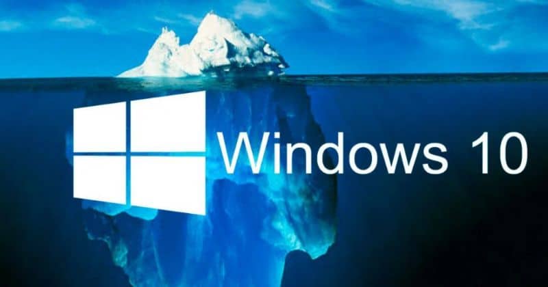 logo de windows 10 con fondo de un iceberg en la superficie y bajo el agua