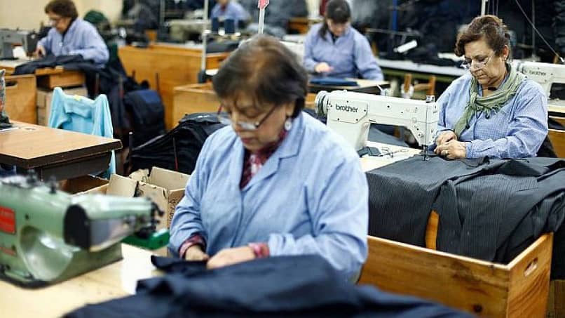 several women working as seamstresses