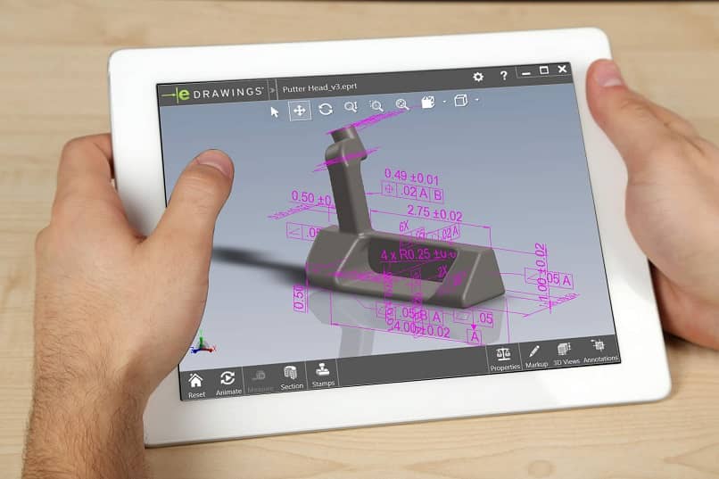 hands modifying an edrw image on a tablet