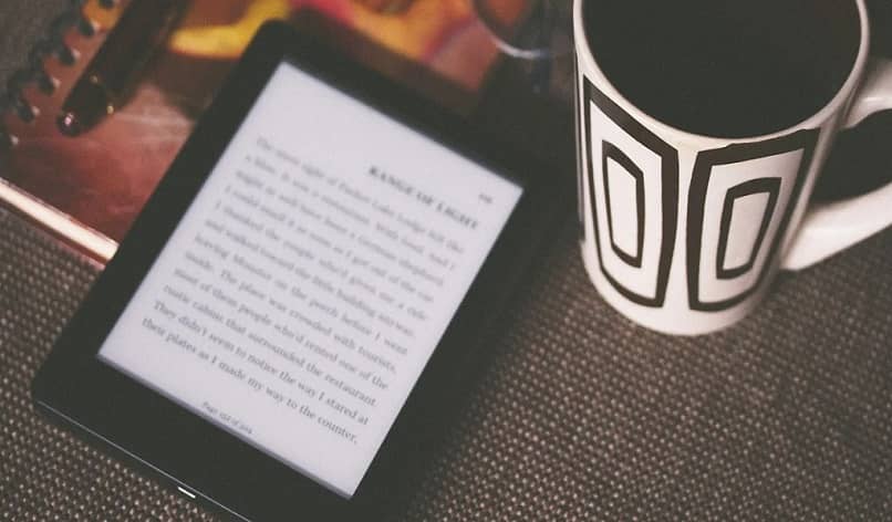 cup of coffee and kindle