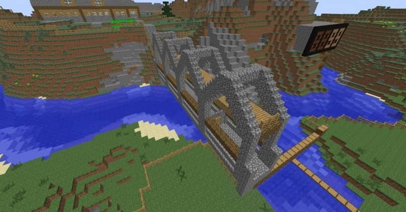 puente de piedra y madera en minecraft sobre un río